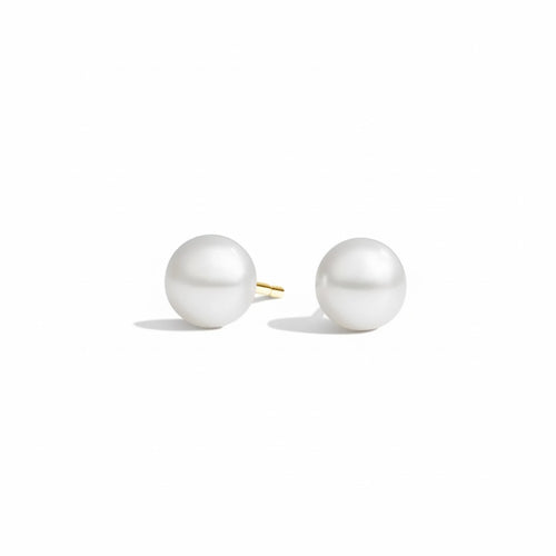 Pair of pearl earrings on a white background